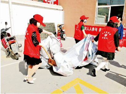 盐湖区北城办石化社区开展环境整治志愿服务活动